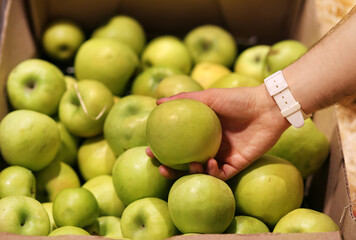 Man buying fruits at the market