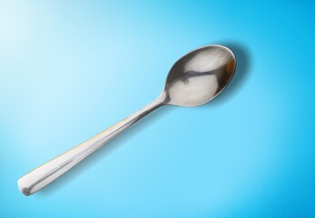Classic cutlery metal spoon on a background