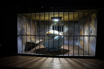 Prison or jail cell wall with window with bars, exterior perspective, COVID-19 corona virus disease...