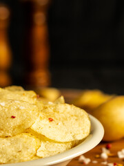 Delicious snack food skin potato chip french fries salad from fresh slice cut chopping by hand raw organic bio sweet potatoes homemade authentic cook healthy oil free bake with salt mayonnaise vegan