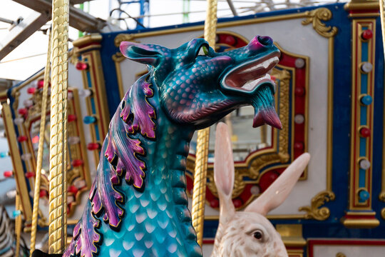 Sea Dragon monster on a carousel merry go round at an amusement park