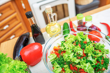 Vegetables on the kitchen table. Healthy food products on the table in the kitchen.