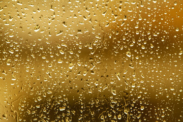 water drops on yellow background