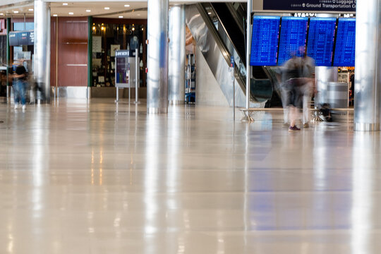 Airport terminal time lapse running figures late for airplane