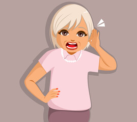 Elder senior woman having acoustic hearing problems gesturing with her hand on ear