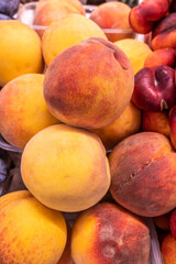 Fresh ripe peaches on the store counter