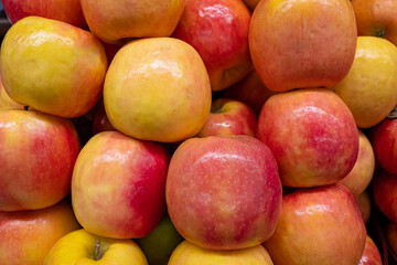 Fresh ripe apples on the counter of a farm shop