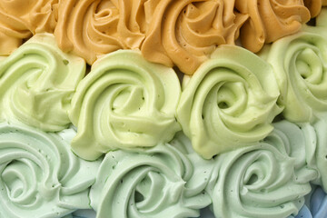 Flower cream on top of beautiful cake