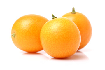kumquat on white background