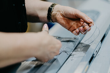 Person working with machine tools in a factory