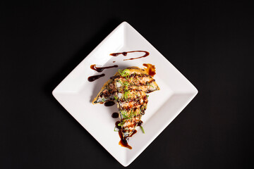 Breaded open temaki with salmon filling and tare sauce