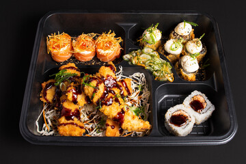 breaded fried fish and varieties in packaging for Japanese food delivery in Brazil