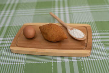 Table with several Brazilian snacks