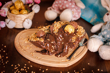 brazilian easter egg with creamy spoon stuffed chocolate bonbon flavor on board