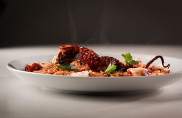 Octopus rice in a white dish