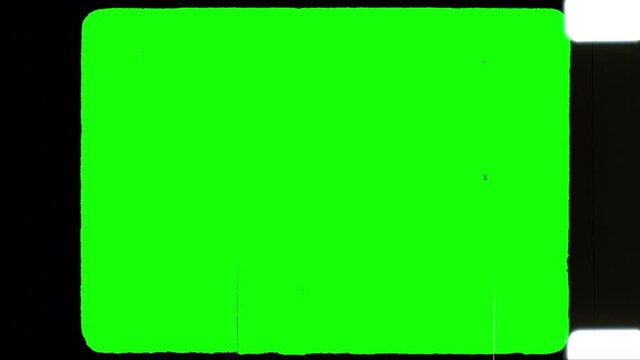 16mm Filmstrip. Seamless 4k loop of an aged celluloid filmstrip. Green screen masked for easy chroma key.