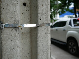 closeup of electric concrete pole.