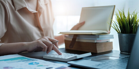 women are reviewing reports, financial documents for financial data analysis, work ideas and market data.