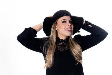 blonde woman wearing black outfit on white background with hat