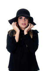 blonde woman wearing black outfit on white background with hat