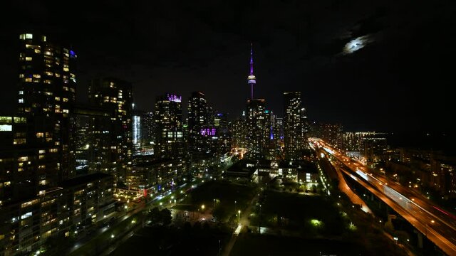 Toronto Night City Scape Time Lapse with the Moon