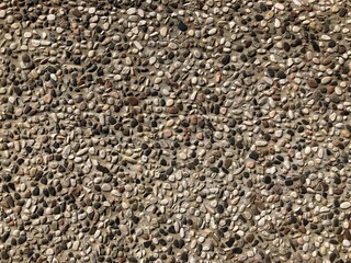 Small gravel wall Mix with white, black gray stone to make a wall or floor in the building. Houses Used as a background. copy space.