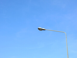 street lamp post with blue sky background