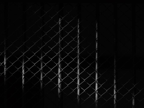 wire mesh of cage with light and shadow, black and white style
