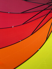 closeup perspective of under the multicolored umbrella