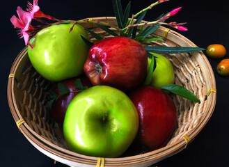 still life of apples and flowers