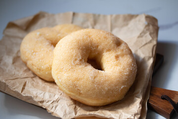 Sweet pieces of sugar donuts Copy space