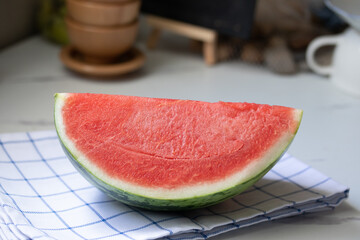 fresh watermelon slices in a white plate