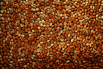 Mixture of raw and roasted coffee beans texture