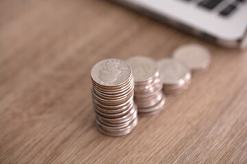 Coins next to the laptop
