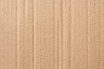 Cardboard sheet texture background, detail of recycle brown paper box pattern.