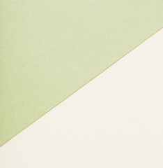  beige and green sheets of paper