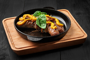 Fried pork sausages with onions and hot mustard