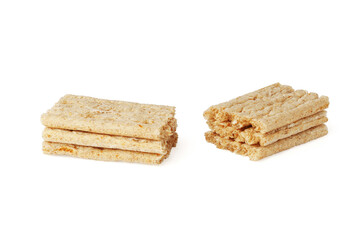 crispbread isolated on white . two stacks of wholemeal crackers