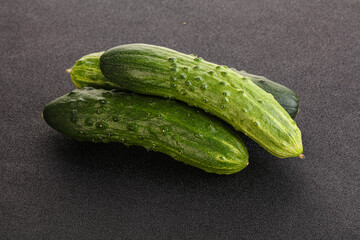 Fersh juicy green cucumbers heap