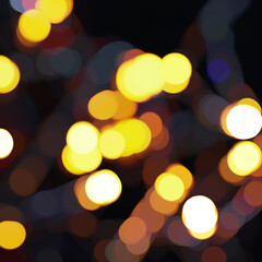 Obraz premium blurred silhouettes of lights on a dark background