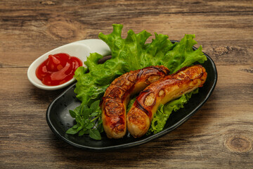 Roasted chicken white sausages with ketchup