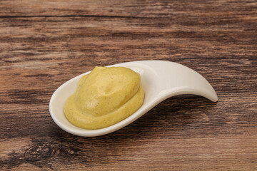 Dijon mustard sauce in the bowl