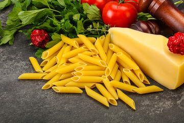 Raw penne rigate for cooking