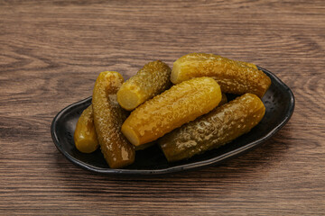 Pickled cucumbers in the plate