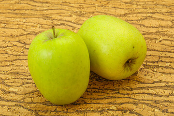 Two ripe green sweet apples