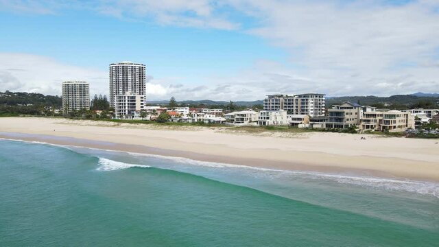 Building Structures At The Oceanfront And The Blue Water Of Palm Beach In The City of Gold Coast, Queensland, Australia. aerial