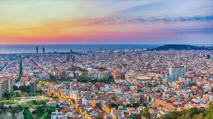 Barcelona Spain, high angle view panorama sunrise city skyline from Bunkers del Carmel