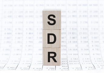 SDR Serpstat Domain Rank inscription on wooden cubes that stand tower on the table