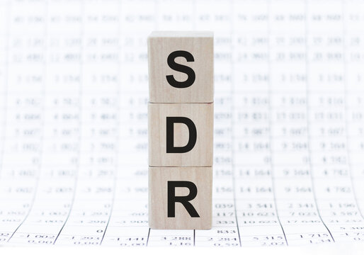 SDR Serpstat Domain Rank inscription on wooden cubes that stand tower on the table