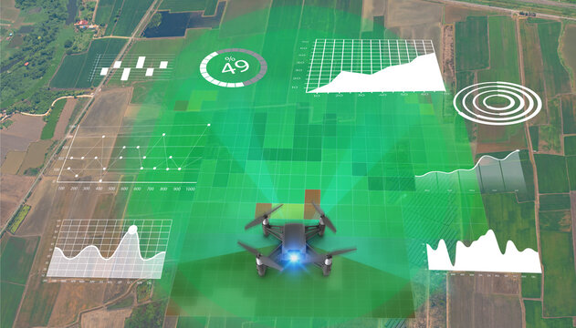 Smart farm, precision farming concept. Use drone for various fields like research analysis, terrain scan technology, monitoring soil hydration, yield problem, take photo and send data.Top view.
